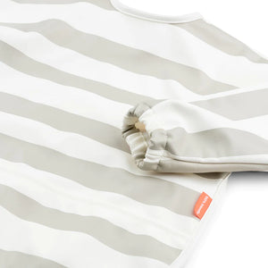 Babero con bolsillo y mangas con rayas Done by Deer
