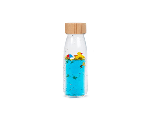 Botella sensorial Move Bottle Ducky Petit Boum — imagen 1