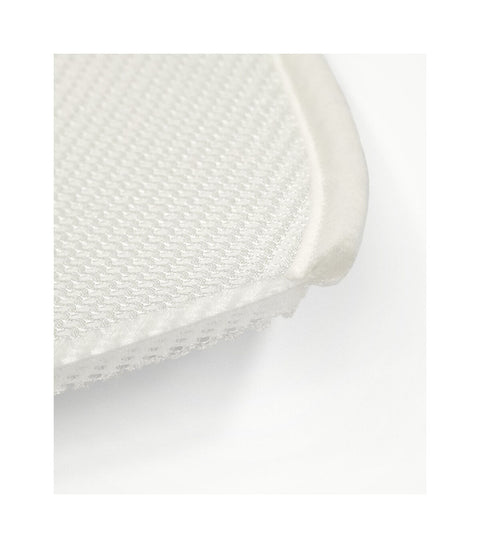 Protector de colchón minicuna Stokke Snoozi