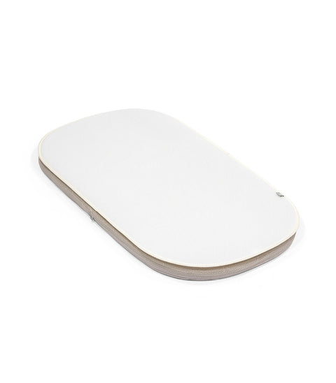 Protector de colchón minicuna Stokke Snoozi