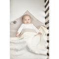 Manta de minicuna Meyco Baby Knots Teddy Off White, 75 × 100 cm, vista 4 de la galería oficial.