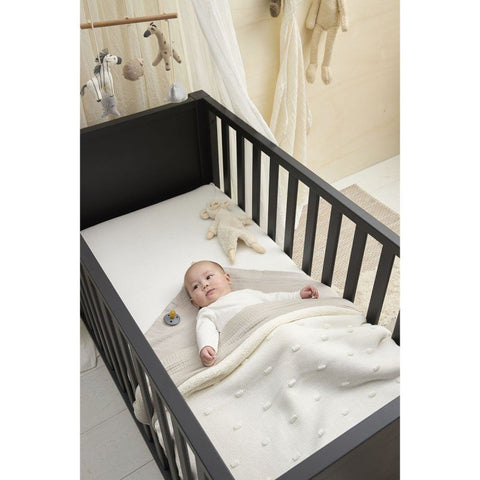 Manta de minicuna Meyco Baby Knots Teddy Off White, 75 × 100 cm, vista 7 de la galería oficial.